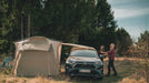 Robens Cobra Stone 5 Berth Dome Tent lifestyle shown connected to vehicle. 